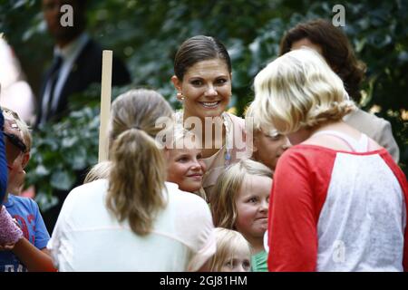 BORGHOLM 20130714 Swedish Crown Princess Victoria greets people at the courtyard of the royal family's summer residence Solliden, on the island of Oeland, Sweden, on July 14, 2012, during the celebrations of Crown Princess Victorias 36th birthday. Photo: Stefan Jerrevang / SCANPIX / code 60160  Stock Photo