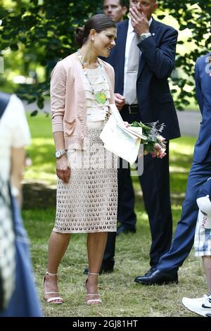 BORGHOLM 20130714 Swedish Crown Princess Victoria greets people at the courtyard of the royal family's summer residence Solliden, on the island of Oeland, Sweden, on July 14, 2012, during the celebrations of Crown Princess Victorias 36th birthday. Photo: Stefan Jerrevang / SCANPIX / code 60160  Stock Photo