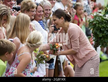 BORGHOLM 20130714 Swedish Crown Princess Victoria greets visitors at the courtyard of the royal family's summer residence Solliden, on the island of Oeland, Sweden, on July 14, 2012, during the celebrations of Crown Princess Victorias 36th birthday. Photo: Stefan Jerrevang / SCANPIX / code 60160  Stock Photo
