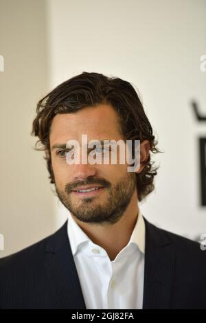 STOCKHOLM 20130812 Prince Carl Philip stands behind the idea and concept development of 'The Swedish Red List,' a new series of plates and bowls from porcelain maker Rorstrand presented on Monday, August 12, 2013 Not pictured designer Anna Lerinder and illustrator Stefan Horberg created the series with images of endangered Swedish plants and animals. Foto: Henrik Montgomery / SCANPIX / kod: 10060  Stock Photo