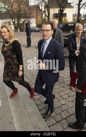 UPPSALA 2013-11-06 Prince Daniel is seen attending the Anders Wall entrepreneurship lecture in the Uppsala University in Uppsala, Sweden. November 6, 2012. At left University Vice-chancellor Eva Akesson. Foto: Fredrik Sandberg / TT / Kod 10080  Stock Photo