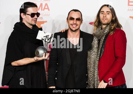 AMSTERDAM 20131110 Members of US rock band Thirty seconds to Mars (from LtoR) Tomo Milicevic, Shannon Leto and Jared Leto pose with their award during the 2013 MTV Europe Music Awards held at the Ziggo Dome in Amsterdam, Netherlands, Sunday November 10, 2013. Foto: Vilhelm Stokstad / TT / Kod 11370  Stock Photo