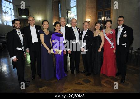 STOCKHOLM 2013-12-10 Prince Carl Philip, Medicine Laureate Thomas C. SÃƒÂ¼dhof and wife Lu Chen, Joy Hirsch and her husband Medicine Laureate James E. Rothman, King Carl XVI Gustaf, Medicine Laureate Randy W. Schekman and his daugther Lauren Schekman, Queen Silvia and Prince Daniel pose for a photo at 'The 'Prince's Gallery' at the Stockholm City Hall during the traditional Nobel Prize gala banquet on Dec. 10, 2013. Photo: Erik Martensson / TT / code 10400  Stock Photo