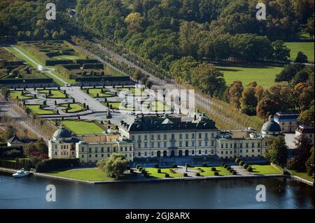 STOCKHOLM 20111003 Aerial photo of the Drottningholm Palace in Ekero, outside Stockholm. The Drottningholm Palace (Swedish: Drottningholms slott) since 1981 the private residence of the Swedish royal family. It is built on the island Lovon in Lake Malaren near Stockholm and is one of Sweden's Royal Palaces. The Royal Domain of Drottningholm is on the UNESCO World Heritage List. With its castle, perfectly preserved theatre (built in 1766), Chinese pavilion and gardens (which consists of a Baroque garden and an English park), it is the finest example of an 18th-century north European royal resi Stock Photo