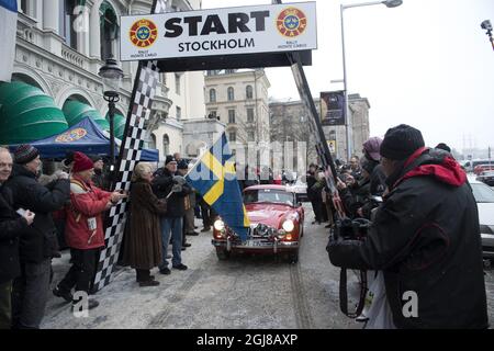 STOCKHOLM 20140123 Rallye Monte Carlo Historique 2014. Legendary rally drivers Bjorn Walder Farm and Ewy Rosqvist von Korff flagged off one of the starts in the Monte-Carlo Rally for historic cars which occurred in front of the Grand Hotel in Stockholm on Thursday, 23 January, 2014. On the way down to the continent the cars will stop at Vastana Castle in Granna and the Volvo Museum in Gothenburg. Foto Bertil Enevag Ericson / TT / kod 10000  Stock Photo
