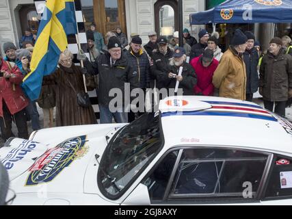 STOCKHOLM 20140123 Rallye Monte Carlo Historique 2014. Legendary rally drivers Bjorn Walder Farm and Ewy Rosqvist von Korff flagged off one of the starts in the Monte-Carlo Rally for historic cars which occurred in front of the Grand Hotel in Stockholm on Thursday, 23 January, 2014. On the way down to the continent the cars will stop at Vastana Castle in Granna and the Volvo Museum in Gothenburg. Foto Bertil Enevag Ericson / TT / kod 10000  Stock Photo