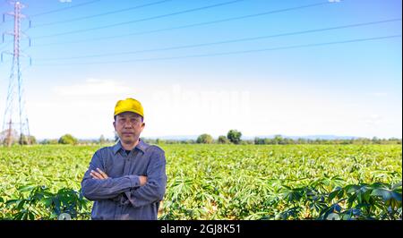 Portrait of a senior farmer in the countryside Stock Photo