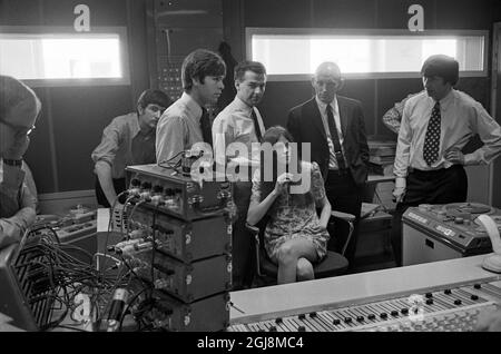 STOCKHOLM 2014-07-24 File 1968 Cliff Richard and singer Cindy Kent and the folksong group 'The Settlers' are seen in a Sweden RadioÃ‚Â´s Studio 3 studio in Stockholm, Sweden 1968. Cliff Richard was in Sweden for a charity tour and to record some of his songs for the radio showÃ¢Â€ÂTonarskvall' (Eng; Teenage NightÃ¢Â€Â). Photo Bo-Aje Mellin/SVT/TT Code 5600  Stock Photo