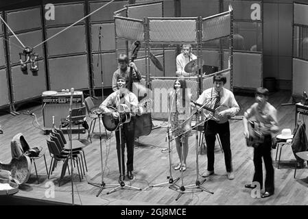 STOCKHOLM 2014-07-24 File 1968 Cliff Richard and singer Cindy Kent and the folksong group 'The Settlers' are seen in a Sweden RadioÃ‚Â´s Studio 3 studio in Stockholm, Sweden 1968. Cliff Richard was in Sweden for a charity tour and to record some of his songs for the radio showÃ¢Â€ÂTonarskvall' (Eng; Teenage NightÃ¢Â€Â). Photo Bo-Aje Mellin/SVT/TT Code 5600  Stock Photo