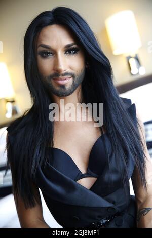 STOCKHOLM 2014-07-30 Austrian singer and Eurovision Song Contest 2014 winner Conchita Wurst (Thomas Neuwirth) pose for a photograph during a news interview at a hotel in Stockholm, Sweden, on July 30, 2014. Wurst is in Sweden to perform during the inauguration of the annual Stockholm Pride Week later tonight. Photo: Fredrik Persson / TT / code 75906  Stock Photo