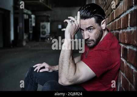 STOCKHOLM 2014-08-21* For your Files* Swedish actor Ola Rapace is seen pocsing for the photographer in Stockholm, Sweden, August 21, 2014. Foto: Anna-Karin Nilsson/ EXP / TT / kod 7141 ** OUT SWEDEN OUT**  Stock Photo