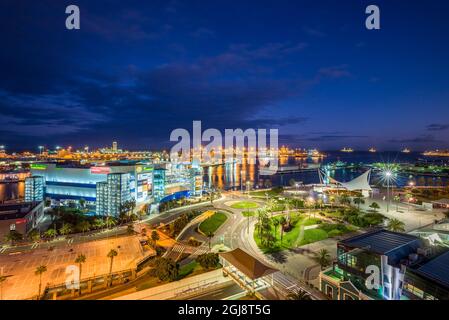 Spain, Canary Islands, Gran Canaria Island, Las Palmas de Gran Canaria, port view with Centro Comercial El Muelle, shopping plaza, dusk Stock Photo