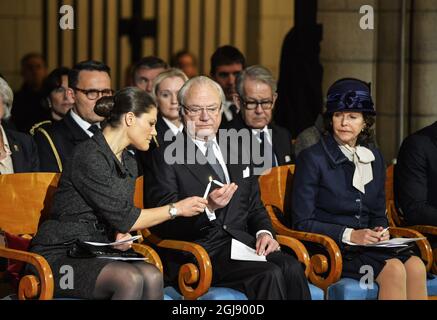 Uppsala 20141226 Crownprincess Victoria, king Carl XI Gustaf and queen Silvia of the Swedish royal family attends the commemoration on the tenth anniversary of the 2004 tsunami victims at the Uppsala Cathedral. Foto: Henrik Montgomery / TT / kod: 10060  Stock Photo