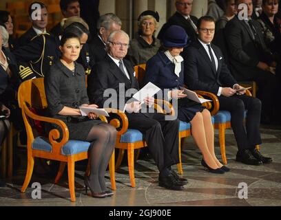 Uppsala 20141226 Crownprincess Victoria, king Carl XI Gustaf, queen Silvia and prince Daniel of the Swedish royal family attends the commemoration on the tenth anniversary of the 2004 tsunami victims at the Uppsala Cathedral. Foto: Henrik Montgomery / TT / kod: 10060  Stock Photo