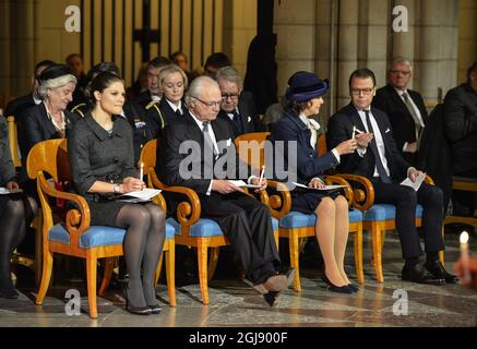 Uppsala 20141226 Crownprincess Victoria, king Carl XI Gustaf, queen Silvia and prince Daniel of the Swedish royal family attends the commemoration on the tenth anniversary of the 2004 tsunami victims at the Uppsala Cathedral. Foto: Henrik Montgomery / TT / kod: 10060  Stock Photo