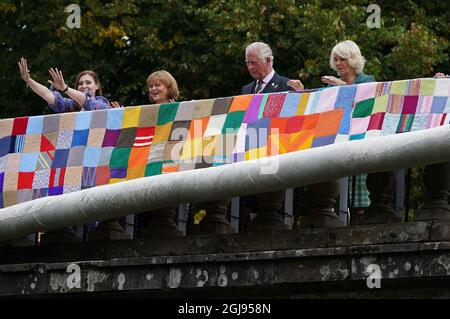 The Prince of Wales Charles and the Duchess of Cornwall Camilla, known as the Duke and Duchess of Rothesay unveil a knitted art installation during a visit to Dumfries House in Cumnock, Ayrshire, Scotland, Britain, September 9, 2021. Andrew Milligan/PA Wire/Pool via REUTERS