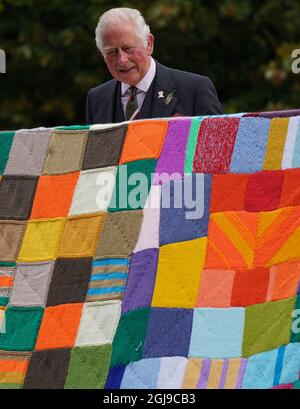 The Prince of Wales Charles also known as the Duke of Rothesay unveils a knitted art installation during a visit to Dumfries House in Cumnock, Ayrshire, Scotland, Britain, September 9, 2021. Andrew Milligan/PA Wire/Pool via REUTERS