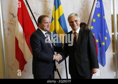 STOCKHOLM 2015-09-08 Austrian Chancellor Werner Faymann (R) is welcomed by Swedens Prime Minister Stefan Lofven at the government building Rosenbad Tuesday Sep. 8, 2015 in Stockholm. Foto: Christine Olsson / TT / Kod 10430  Stock Photo
