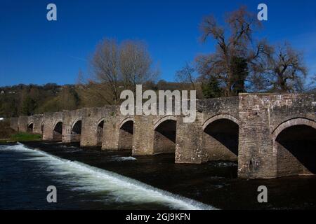 United Kingdom, Wales, Crickhowell. Stone bridge over the river Usk. Stock Photo