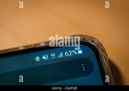 real 5g signal on a smartphone screen. close up view Stock Photo