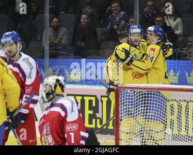 Sweden's Dennis Everberg (18) has scored and celebrate with Joel Eriksson Ek (24) Czech goal keeper Jakub Kovar (L) during Sweden Hockey Games match between Czech Republic and Sweden in Scandinavium Arena, Gothemburg Thursday Feb. 9, 2017. Photo Adam Ihse / TT kod 9200 Stock Photo