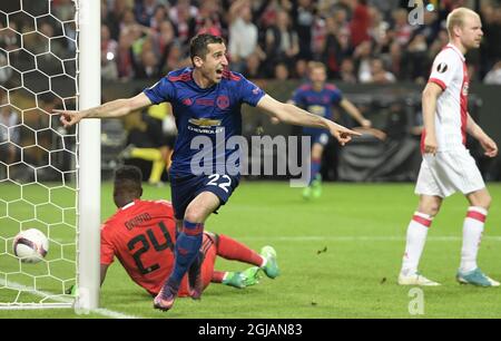 STOCKHOLM 20170524 Uniteds Henrikh Mkhitaryan (L) celebrate his second goal for his team during the UEFA Europa League final match between Ajax and Manchester United at the Friends Arena in Stockholm, Sweden on 24 May 2017. Photo: Anders Wiklund / TT NEWS AGENCY / code 10040 Uniteds Paul Pogba grattas av Matteo Darmian och Henrikh Mkhitaryan efter att ha gjort 0-1  Stock Photo