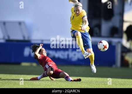 Mexico's Monica Ocampo (L) fights for the ball with Sweden's Lisa Dahlkvist during the women's friendly soccer match between Sweden and Mexico at Falkenberg Arena in Sweden. Photo: Bjorn Larsson Rosvall / TT / code 9200  Stock Photo