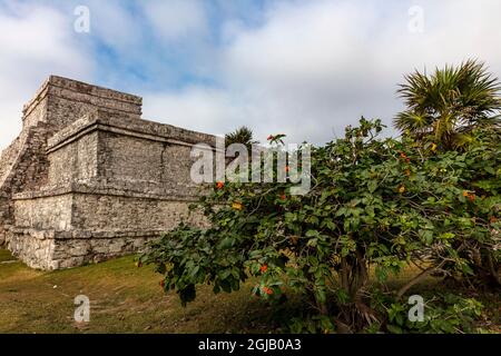 Temple of the Wind at Archeological Zone of Tulum Mayan Port City Ruins in Tulum, Mexico Stock Photo