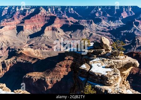 Snow Covered Limestone Ledges and Rock Formations of Mather Point on The South Rim, Grand Canyon National Park, Arizona, USA Stock Photo