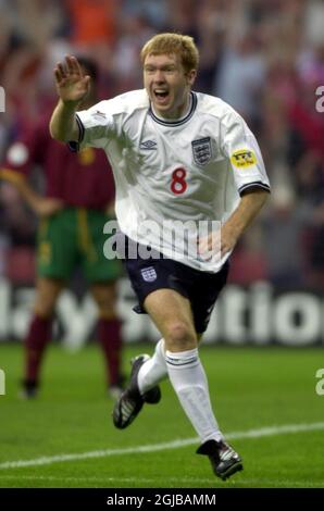 England's Paul Scholes celebrates scoring the opening goal against Portugal  Stock Photo