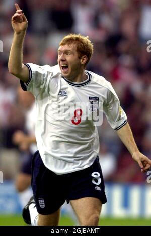 England's Paul Scholes celebrates scoring the opening goal against Portugal  Stock Photo