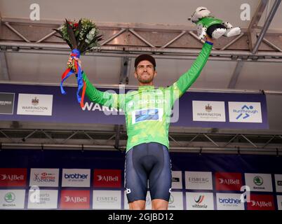 Canyon dhb SunGod’s Jacob Scott on the podium after stage five of the AJ Bell Tour of Britain from Alderley Park to Warrington. Picture date: Thursday September 9, 2021. Stock Photo