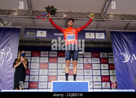 Canyon dhb SunGod’s Jacob Scott on the podium after stage five of the AJ Bell Tour of Britain from Alderley Park to Warrington. Picture date: Thursday September 9, 2021. Stock Photo