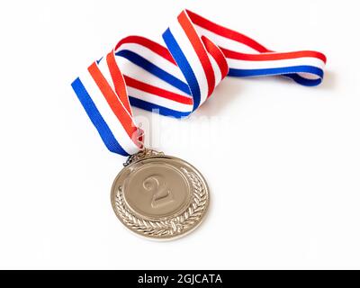 Medal on a red, white and blue ribbon Stock Photo - Alamy