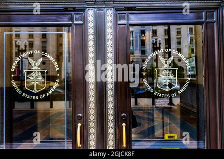 Symbols on main entrance of Herbert Hoover Building Commerce Department, 14th Street, Washington DC. building completed in 1932. Stock Photo