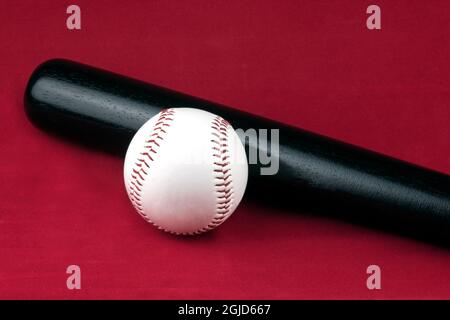 red and black baseball ball