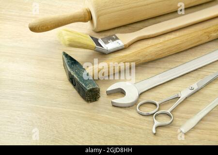 Various handcraft tools on wooden background Stock Photo