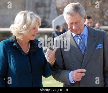 The Prince of Wales and Camilla, Duchess of Cornwall pose in front of the 15th century Selimiye Mosque and Mevlana museum containing the tomb of Mevlana Jalaluddin Rumi, the founder of Sufi Islam, in the central Turkish city of Konya Stock Photo