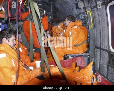 12 sailors were rescued by a Sea King helicopter from the Norwegian 330th division when the cargo ship 'Victor Koryakin' sank outside Fiskerhalvøya outside Murmansk, Russia Stock Photo