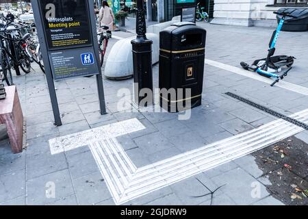 Tactile paving, tactile guideways for the visually impaired, blind people. Photo: Amir Nabizadeh / TT code 12040  Stock Photo