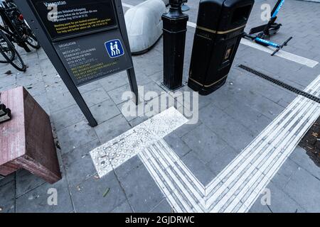 Tactile paving, tactile guideways for the visually impaired, blind people. Photo: Amir Nabizadeh / TT code 12040  Stock Photo