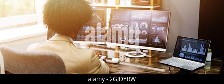 African American Business Data Analyst Man Using Computer Stock Photo