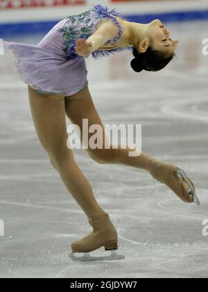 South Korea's Yu-Na Kim performs her routine in the ladies short program of the World Figure Skating Championships in Gothenburg, Sweden. Stock Photo