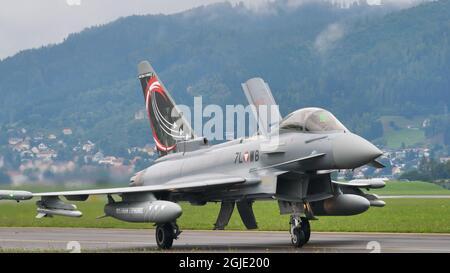 Zeltweg, Austria SEPTEMBER, 6, 2019 Front close up of a military aircraft with air brake open and colored tail. Eurofighter Typhoon EFA of Austrian Air Force Stock Photo