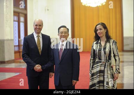 Swedish Prime Minister Fredrik Reinfeldt and his wife Filippa is welcomed to the Great Hall of the People by Prime Minister Wen Jiabao of China in Beijing, China. Stock Photo