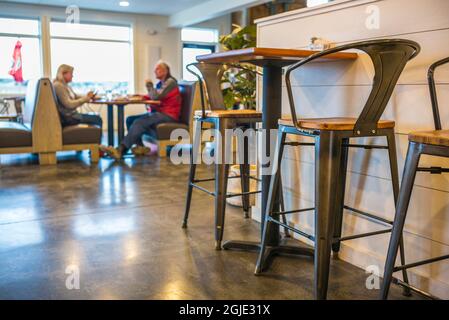 USA, Maine, Machias, Helen's Restaurant, interior with patrons. Stock Photo
