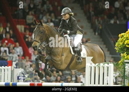 Germany's Meredith Michaels-Beerbaum and her horse Shutterfly won the FEI World Cup final during Gothenburg Horse Show at the Scandinavium arena in Gothenburg, Sweden. Stock Photo