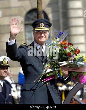 King Carl XVI Gustaf celebrated his 62th birthday Wednesday receiving flowers from children at the courthouse of the Royal palace in Stockholm, Sweden. Stock Photo