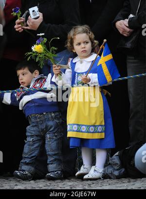 King Carl XVI Gustaf celebrated his 62nd birthday Wednesday receiving flowers from children at the courthouse of the Royal Palace in Stockholm, Sweden. Stock Photo