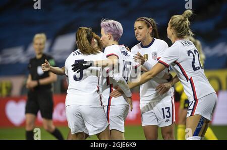 Megan Rapinoe (#15) of USA celebrates with teammates after scoring a penalty during a friendly international soccer match between Sweden and USA at Friends Arena in Stockholm, Sweden, on Saturday April 10, 2021. Photo Janerik Henriksson / TT kod 10010 *SWEDEN OUT* Stock Photo